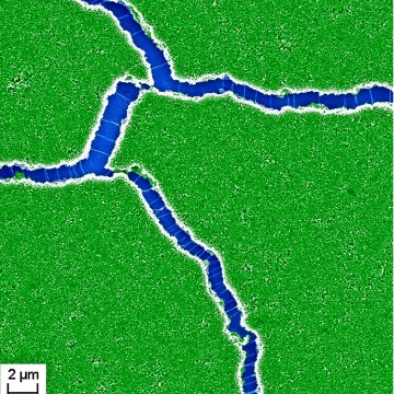 Cracks in a 1.5 micron thin film of manganese dioxide nano flake & single walled carbon nanotube composite